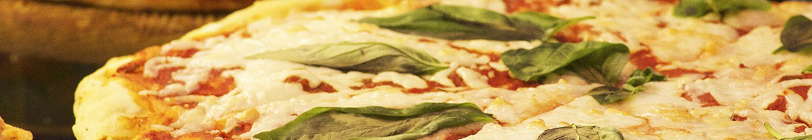 Eating Italian Pizza at Dino's Italian Restaurant restaurant in Westminster, CA.